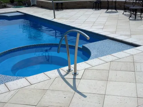 Copano Pools and Spas elegant fiberglass pool with water features